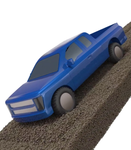 Simulation numérique d'un pick-up bleu en mouvement sur un terrain accidenté.